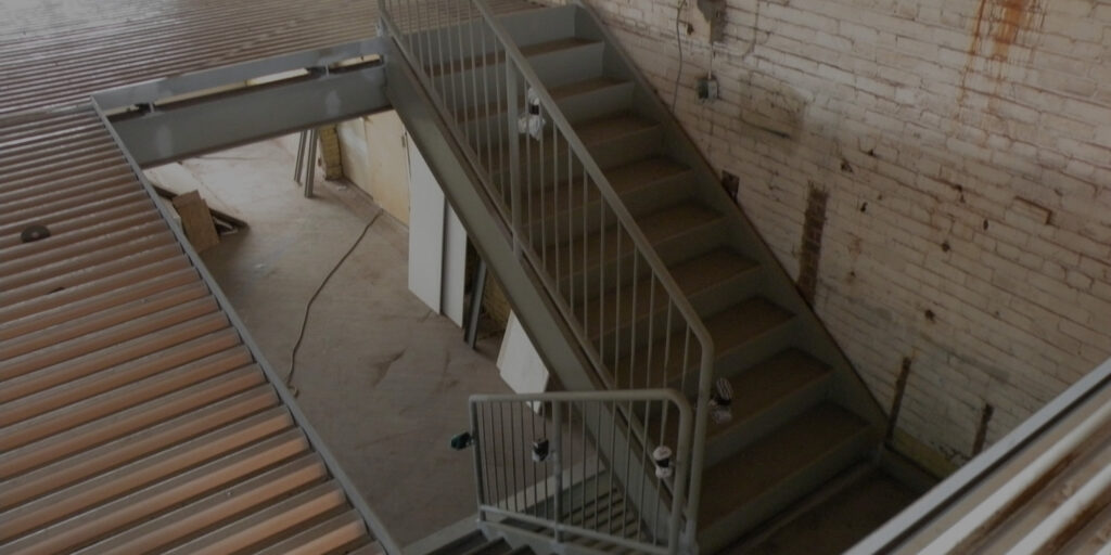 A structural steel staircase installed by Penn-American