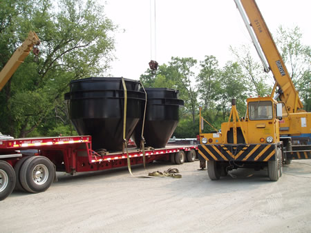 Carbon steel vents on the back of a flatbed trailer