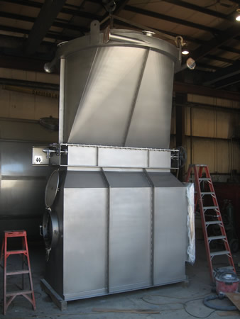 A stainless steel vent being installed